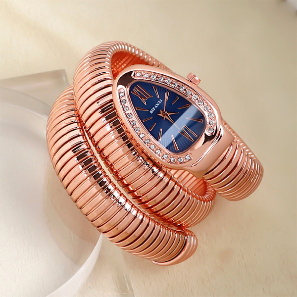 Käärmekello, naisten muodikäs rannekello, luova kvartsikello rose gold, blue dial