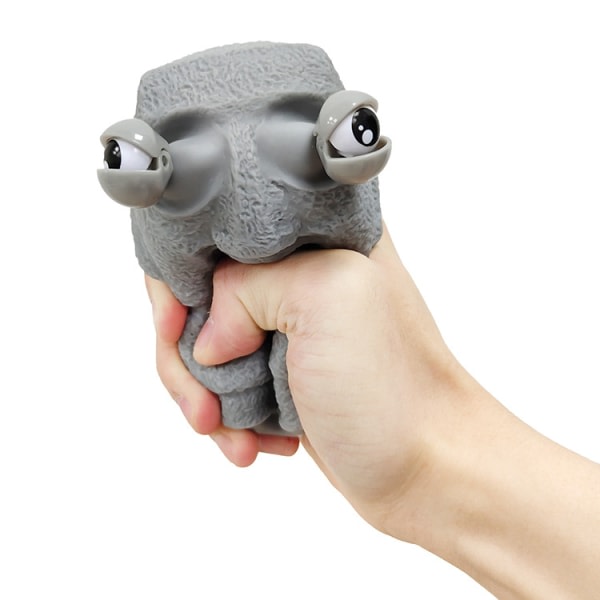 Squeeze-legetøj med pop-out-øjne Mini Rock Man Stress Relief til børn og teenagere (gul)