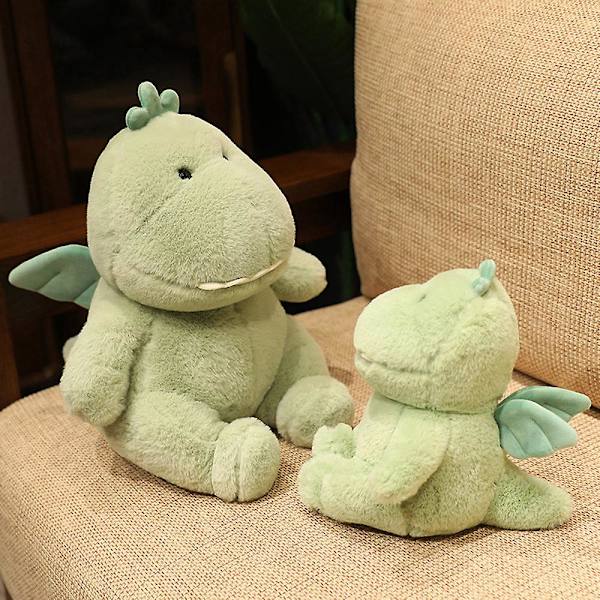 Kreativ tecknad plyschleksak grön dinosaurie med vingar fyllda docka barngåvor