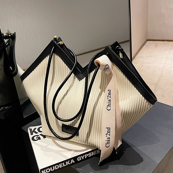 High-end vesker for kvinner 2024 ny koreansk stil moteriktig allsidig skulderveske stor kapasitet pendler tote bag