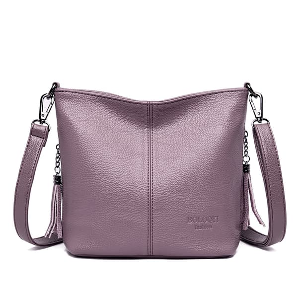 Autentiska Tofs Dam Crossbody Väskor Lyxiga Läder Väskor och Handväskor Dam Axelväskor Designer Hinkväskor Lila