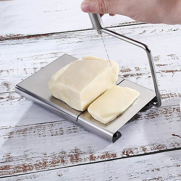 Rustfritt stål håndkjøkken ost stålplate smørtrådkutting verktøy kjøkken, spisestue og bar kule utendørs gadgets for hjem (sølv, en størrelse)