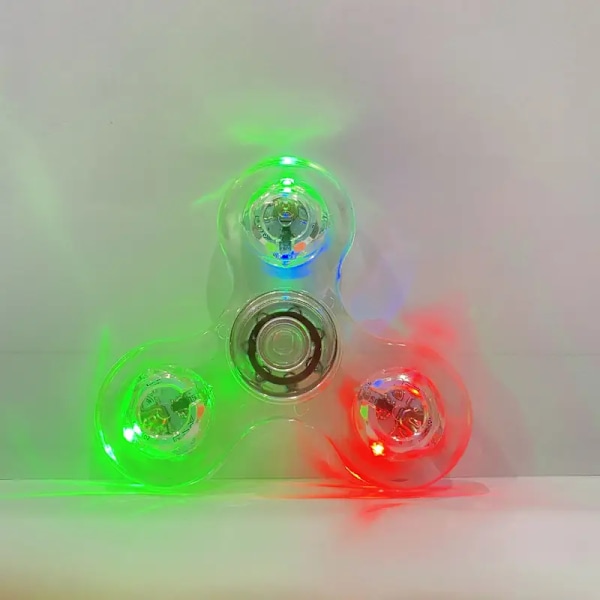 Crystal Luminous LED-valoinen pyörivä käsikierros, hohtaa pimeässä EDC-lelu, kineettinen gyroskooppi lapsille