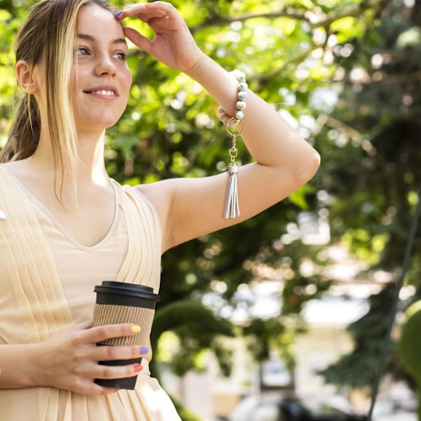 Silikonperle Armbånd Nøglering Håndledsrem Nøglering Bangle Kæder til Kvinder med Læder Kvast Flower Yellow