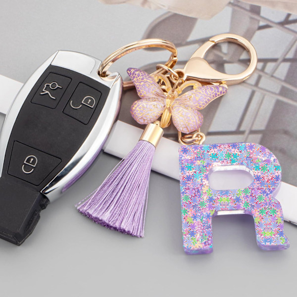 Sööt roosad võtmehoidjad naistele ja tüdrukutele, algustähega võtmehoidjad tutiga, ripatsid võtmetele, rahakotile, käekottidele ja seljakottidele Purple Butterfly Letter-r