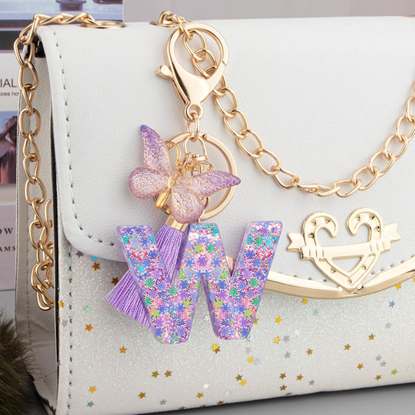 Sööt roosad võtmehoidjad naistele ja tüdrukutele, algustähega võtmehoidjad tutiga, ripatsid võtmetele, rahakotile, käekottidele ja seljakottidele Purple Butterfly Letter-w