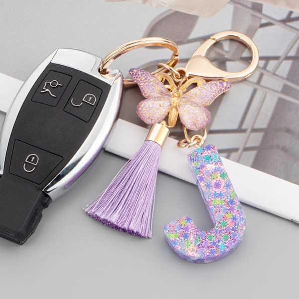 Sööt roosad võtmehoidjad naistele ja tüdrukutele, algustähega võtmehoidjad tutiga, ripatsid võtmetele, rahakotile, käekottidele ja seljakottidele Purple Butterfly Letter-j