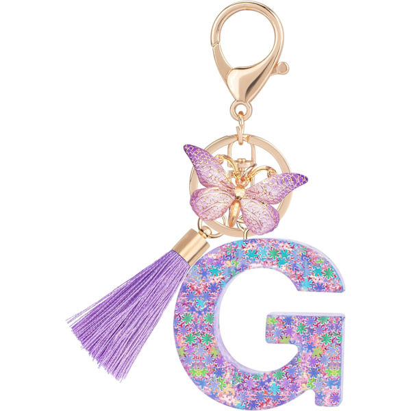 Sööt roosad võtmehoidjad naistele ja tüdrukutele, algustähega võtmehoidjad tutiga, ripatsid võtmetele, rahakotile, käekottidele ja seljakottidele Purple Butterfly Letter-g