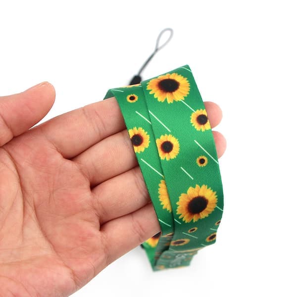Praktisk lanyard (solsikke/stjerner) Sort