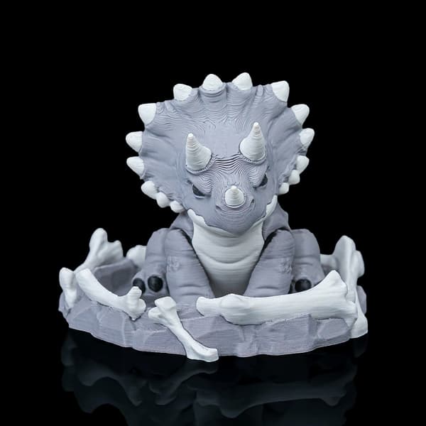 Dinosaurie Fidget-leksaksfigur med bo | Dini Mini Dino grå M