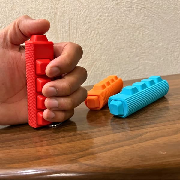 Fidget-klickare med 5 knappar och diamantmönster – för handflatan Röd M