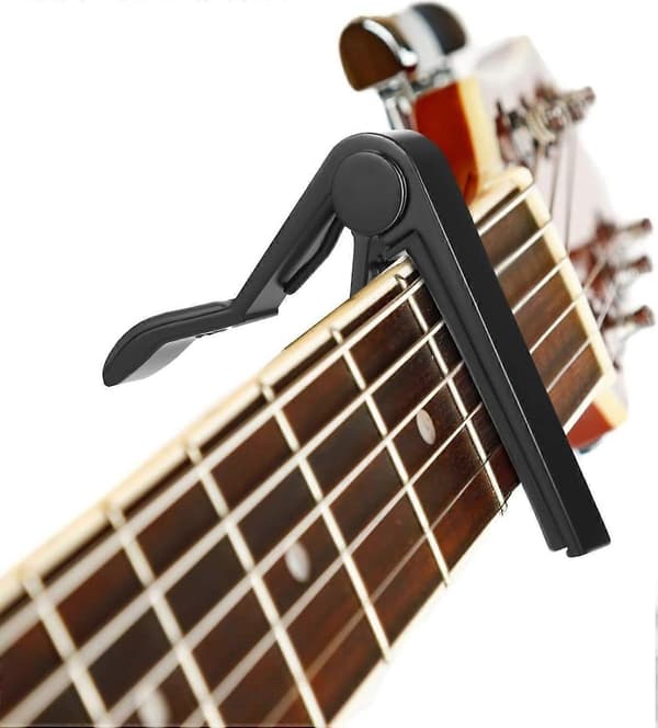 Gitarr för akustiska och elektriska gitarrer med 5 plektrum (Svart)