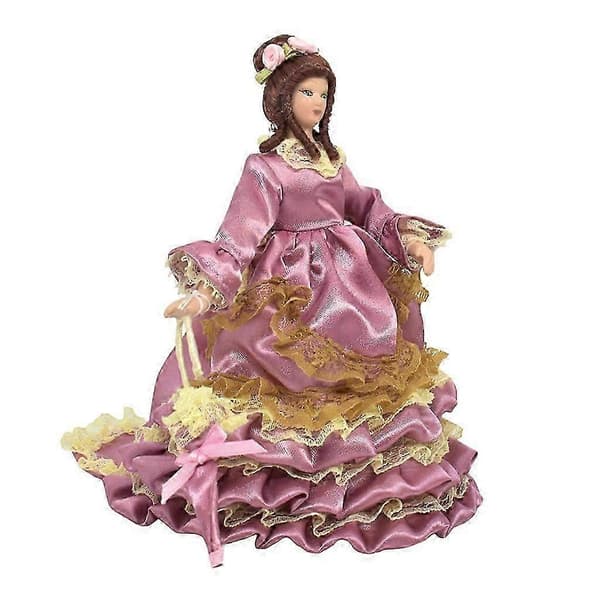 Porslinsdocka i skala 1/12, rosa klänning, dockskåpsminiatyr