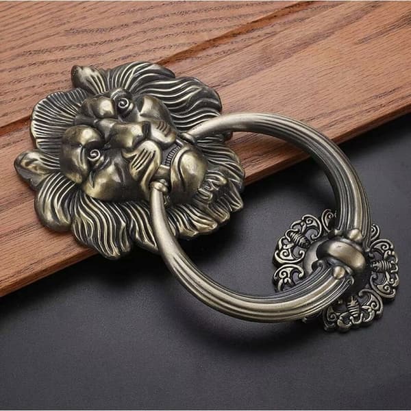 Dørhammer Løvehoved, Bronze