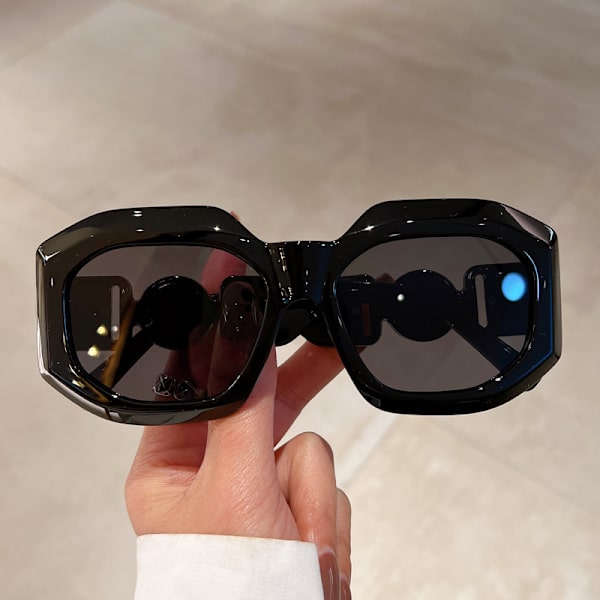 Sorte oversized solbriller for menn og kvinner