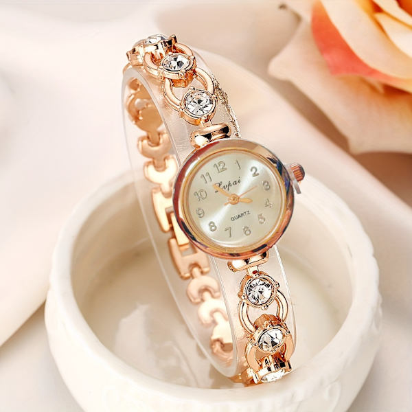 Snygg damklocka Strass