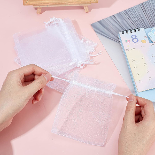 100 kpl valkoisia organza-pusseja 10x12cm läpinäkyvät organza-pussit vetoköydellä