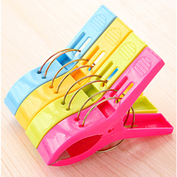 Pack of 4  Bright Colour Plastic Beach Towel Pegs Clips to Sunbed