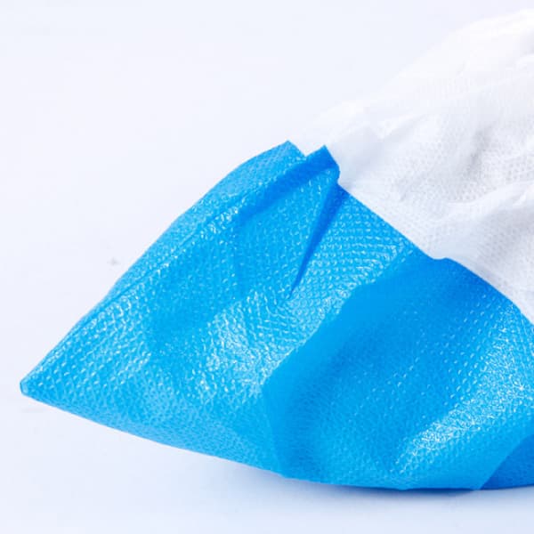 100 stk engangs skoposer i non-woven - blå/hvit