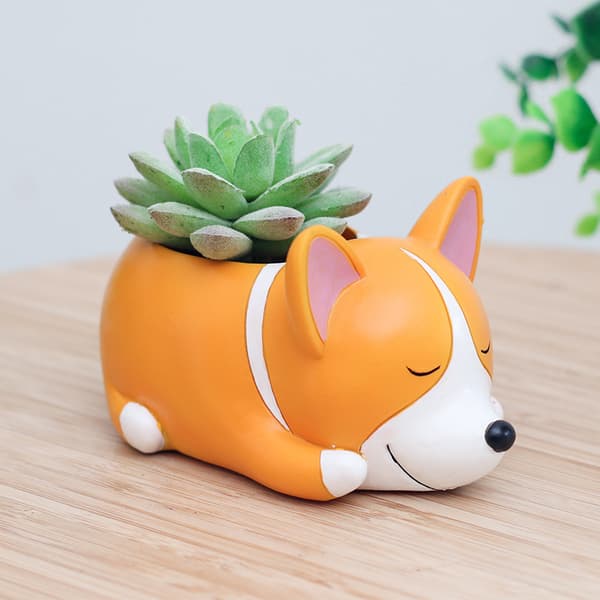 Corgi-formet blomsterpot i harpiks