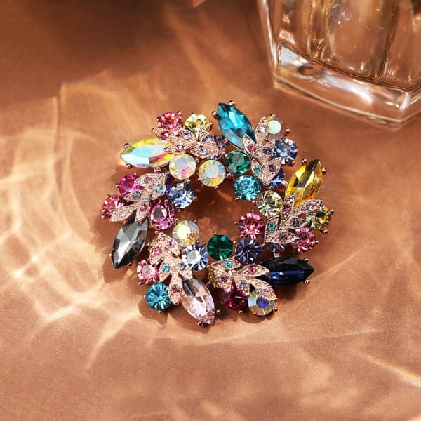 Temperament kristallkrans brosch