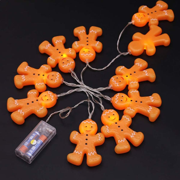Varmt vita pepparkaksgubbe ljusslingor kan användas för fest, g