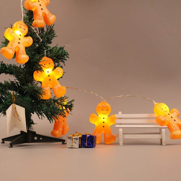 Varmt vita pepparkaksgubbe ljusslingor kan användas för fest, g