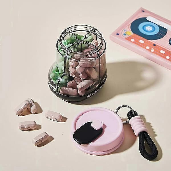 bærbar mini reise pilleboks arrangør med 4 rom Pink
