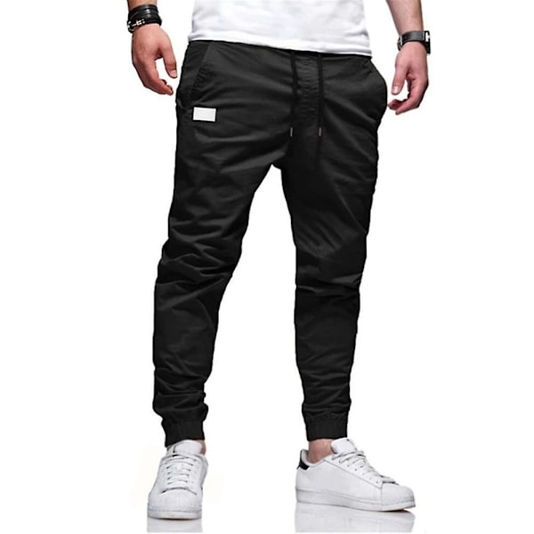 Miesten yksiväriset kiristysnyörillä joustavat vyötäröhousut Black XL