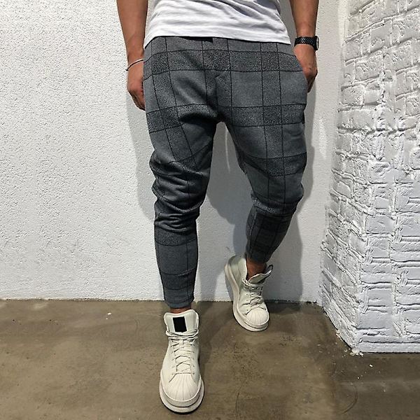 Rutigt haremsbyxor för män med fickor. Skinny byxa Gray L