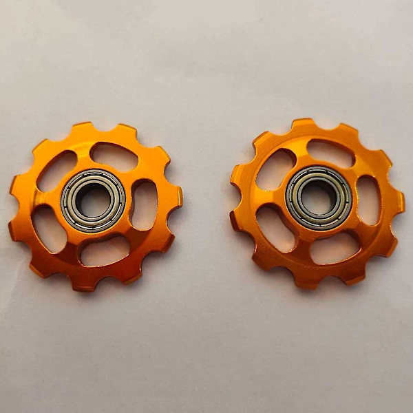 Set med 2 bältescykelhjullager 11t aluminium för Shimano (guld)