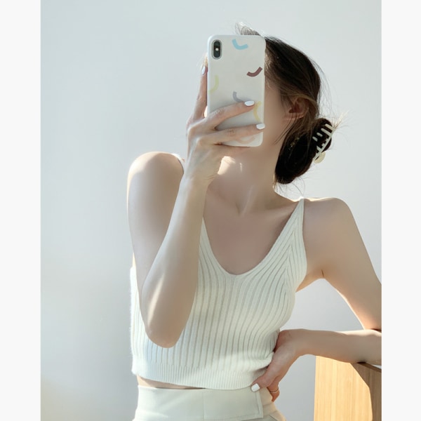 Oikean kulutuksen syvä V-pääntie neulottu camisole valkoinen