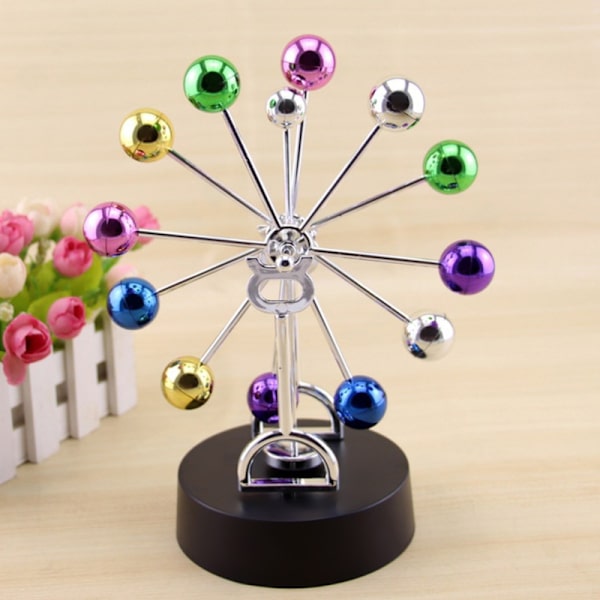 Plastic roterende perpetuum motion hjemme spisebord ornament model