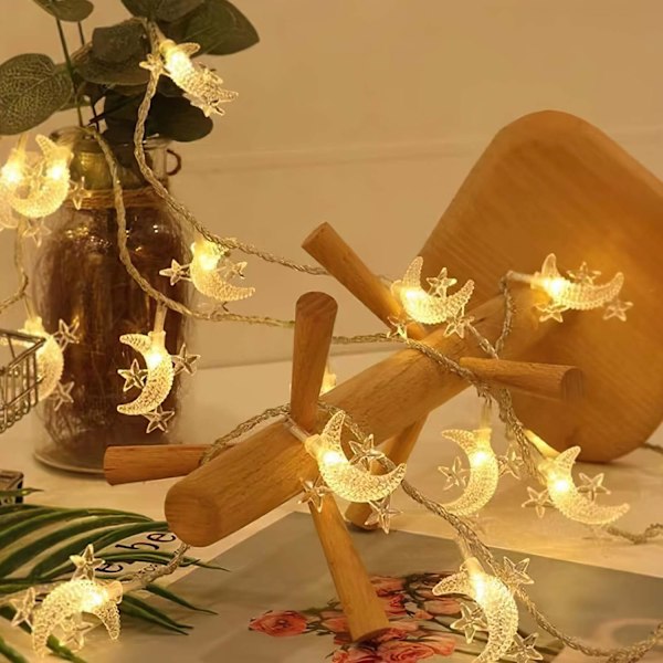 Silikon-fe-lys for julepynt Stjerne og måne, varme farger. Star and moon, warm colors. 20 m200lamps plug-in version