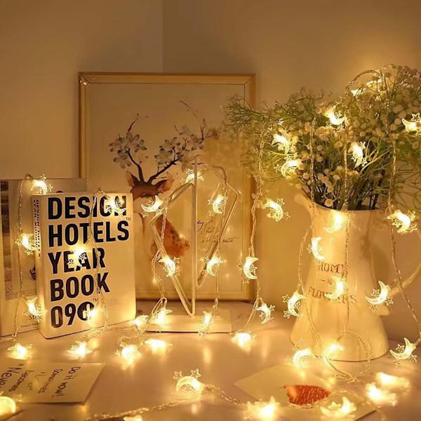 Silikon-fe-lys for julepynt Stjerne og måne, varme farger. Star and moon, warm colors. 3 m20lights 2 battery packs