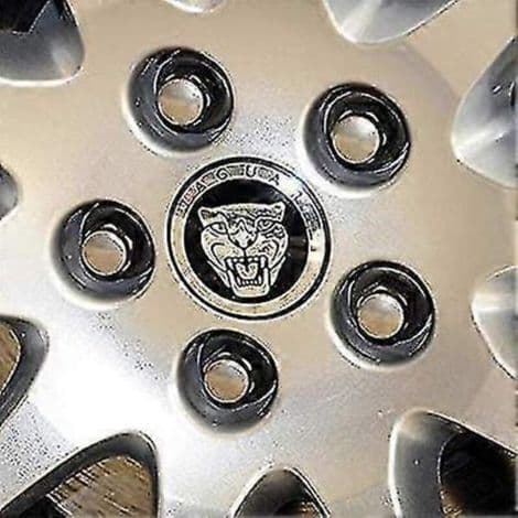 Sarja 4 mustaa 59 mm:n pyöränsuojusta Jaguar X Type XK:lle
