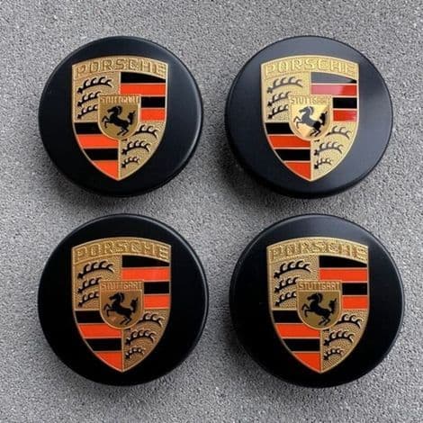 Svarta böjda 76 mm Porsche navkapslar med logotyp. Färgsortiment