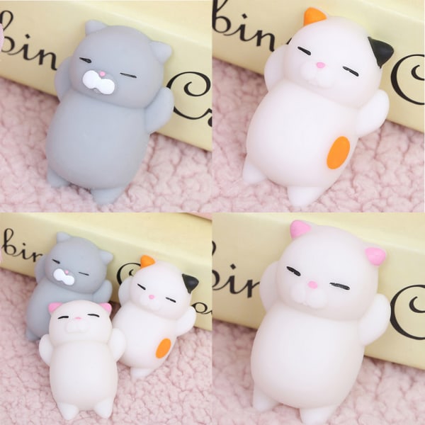 Super sakte, myk stigende Squishy e Cat Expression Smile Face Toy 0 0