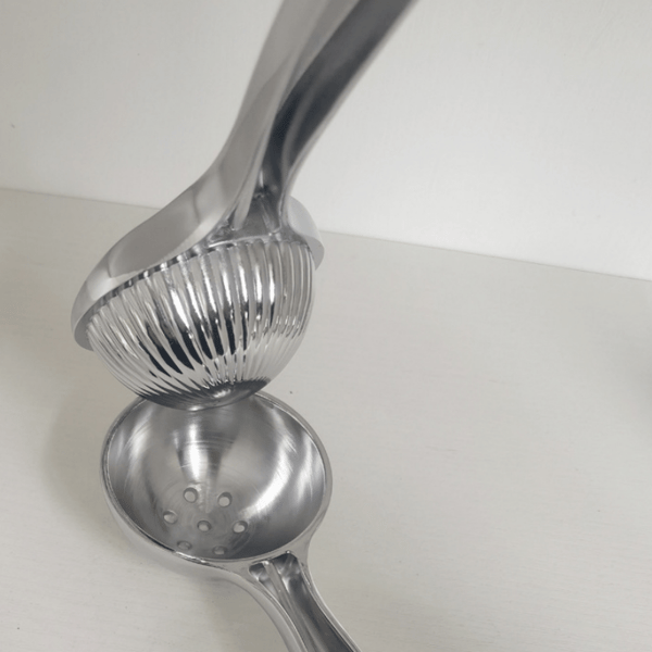 Kompakt manuell sitruspresse for appelsiner og sitroner 1pc