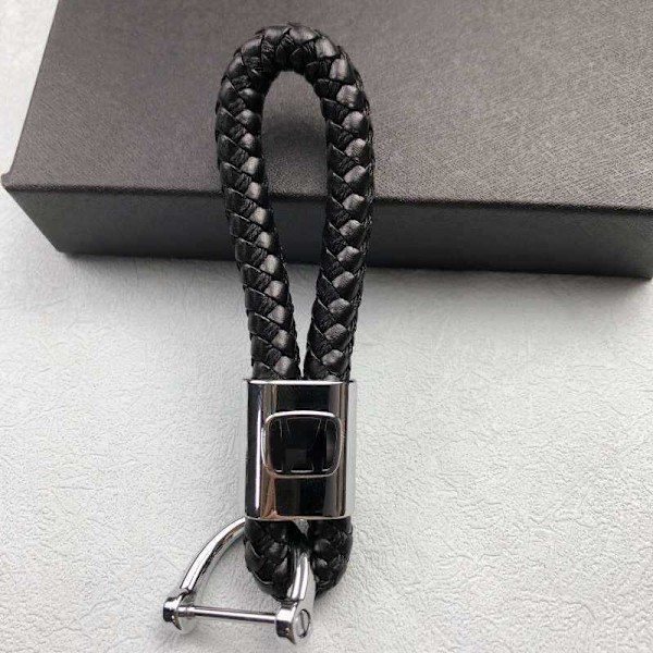 Enkel bil logo håndvævet reb nøglering - Stilfuld og kreativ high-end nøgleholder til mænd og kvinder Benz