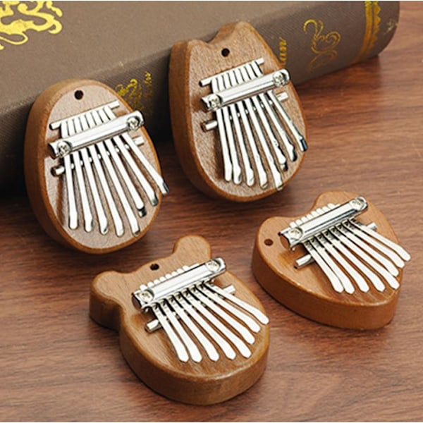 8 Tangenter Utsökt Finger Tumme Piano Gåva Mini Tumme Piano Perfekt för Nybörjare W3K9 Teardrop One size