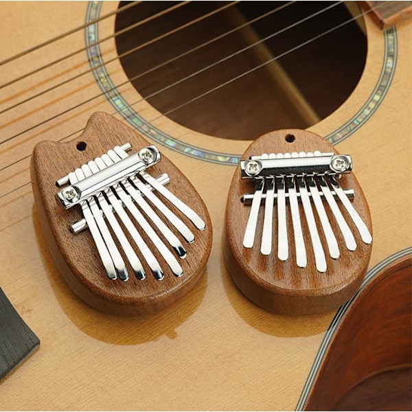 8 Tangenter Utsökt Finger Tumme Piano Gåva Mini Tumme Piano Perfekt för Nybörjare W3K9 Teardrop One size