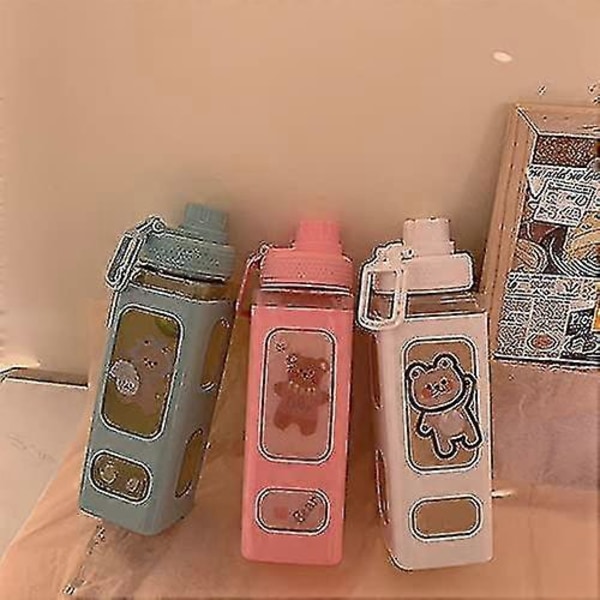 700 ml:n vesipullo pillillä, söpö urheilujuomapullo tarralla, kawaii-juomapullo