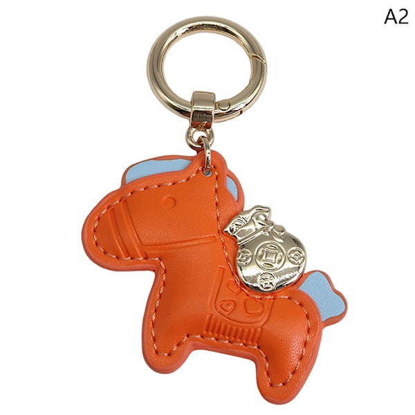 Läder Charms Bag Pendel Keychain Cartoon Horses Keyring e An Orange