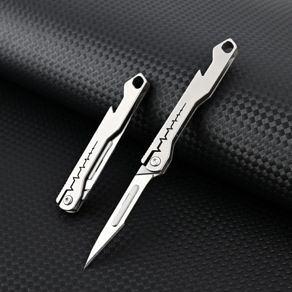 Miniflasköppnare Skalpell Titanium Alloy G10 Handtag Vikbar O