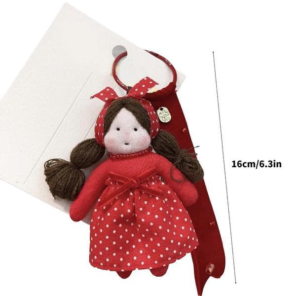 Red plush doll keychain, portable key holder with strap, festive accessory for bags and keys