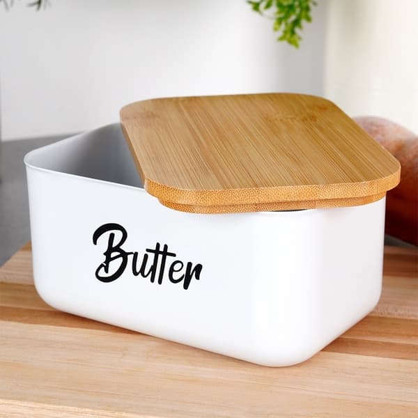 Smørboks i hvitt stål med bambuslokk og teksten Butter