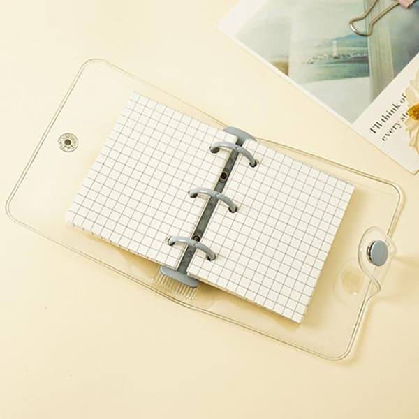 Mini transparent 3-ring binder with grid pages and pockets, clear PVC cover with snap button