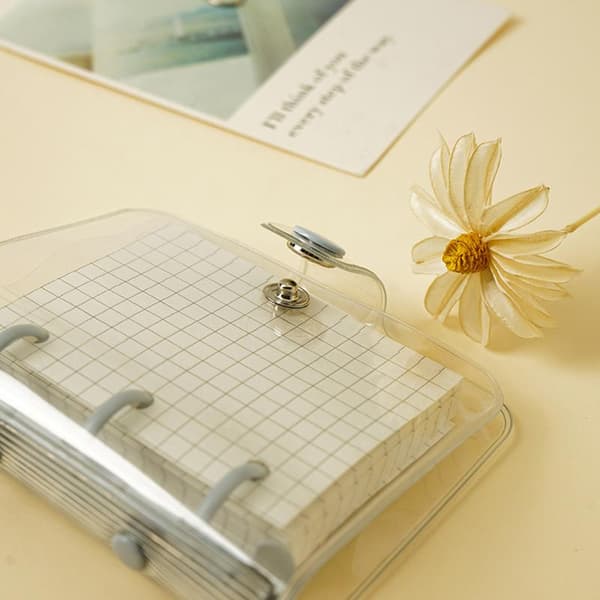 Mini transparent 3-ring binder with grid pages and pockets, clear PVC cover with snap button