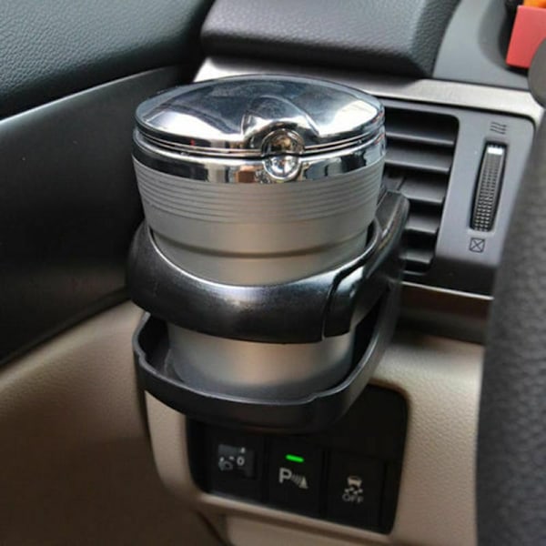 Universaali auton mukiteline - Tölkkiteline tuuletusritilään - Auton mukiteline - Universaali autoteline - Auton pulloteline - Auton juomateline H